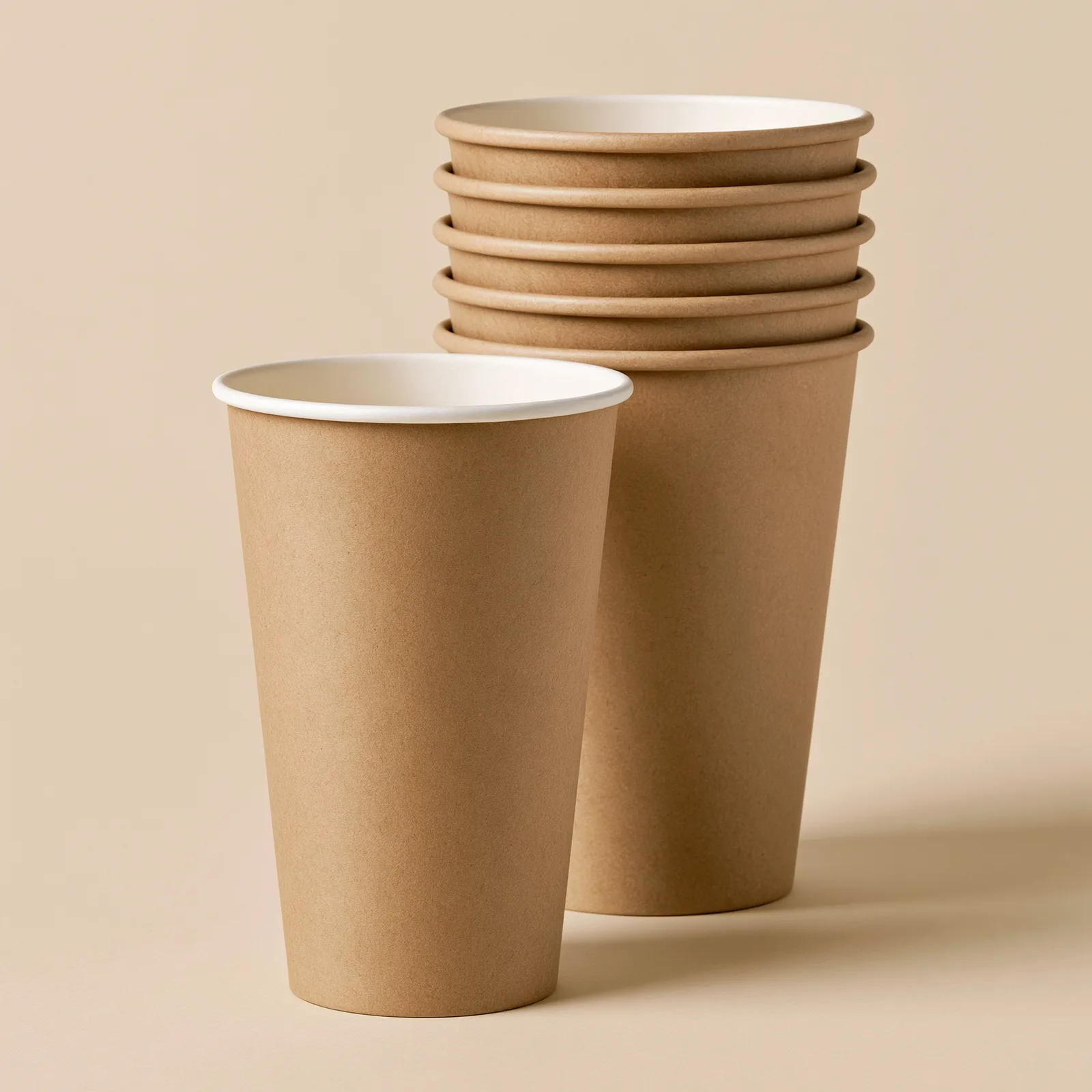Stack of kraft 12oz compostable hot drink cups